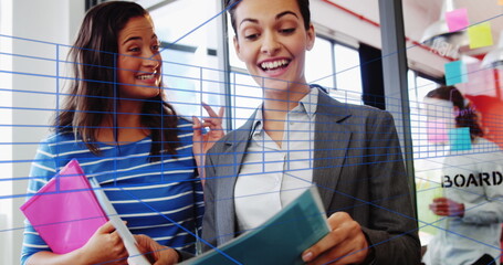 Wall Mural - Image of blue lines over diverse business people at office