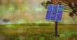 Image of solar panel over trading board on green landscape