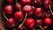 Vibrant close-up of juicy red cherries in a ceramic bowl, tempting and delicious fresh fruit display