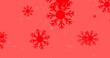 Image of snow falling on red background