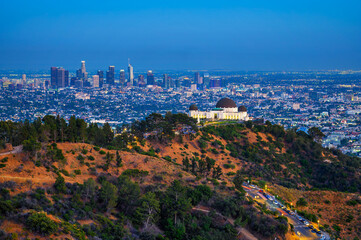 Wall Mural - Griffith Observatory and Los Angeles skyline photographed from Griffith Park after sunset.