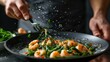 © Ashi - Expert chef preparing succulent shrimp and sprig beans: healthy seafood cooking on dark background