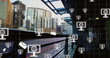Image of network of screen icons with globes over train platform