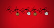 Image of bauble swinging on leaves against red background