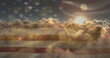 Image of glowing spots and sun shining on sky with clouds over american flag