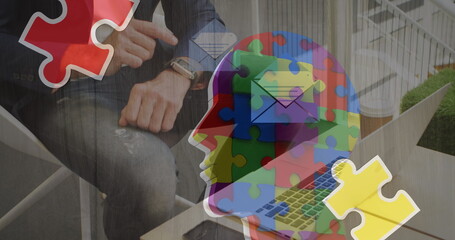 Sticker - Image of colourful puzzle over caucasian businessman