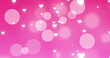 Image of dots and hearts on pink background
