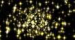 Image of stars falling over golden bauble on black background
