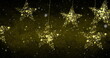 Image of lights floating over golden stars on gold background
