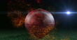 Image of moving lens flare and abstract pattern over rugby ball on green ground