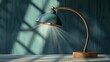   A desk lamp on a wooden table in a room Blue wall background Window admits incoming light