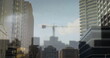Image of moving cityscape with crane and modern buildings in city in the background 4k