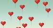Digital image of multiple red heart shaped balloons floating against green background
