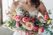 © Maelgoa - Detailed shot of a brunette bride's hands holding her wedding bouquet, the vibrant blooms and trailing ribbons adding to the beauty of the moment as she prepares to make her grand entrance 03