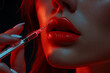 A close-up view of a female model's hand holding a needle for a lip filler treatment, emphasizing the precise and delicate approach to modern cosmetic enhancements and beauty procedures.