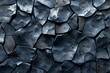 This image features a dark blue abstract pattern with textured geometric shapes and light speckle accents