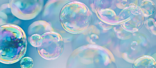 Wall Mural - Multi-colored soap bubbles on a blue background
