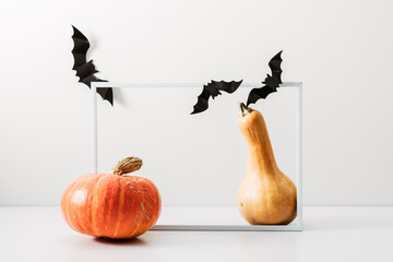 Wall Mural - Halloween holiday concept. Photo frame, halloween decorations on white background. Front view, copy space