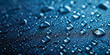 Close-up of Water Droplets on a Dark Shiny Surface - Texture Background