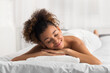 © Prostock-studio - African-american woman in spa salon, waiting for massage