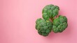 Broccoli vegetables healthy food top view on the pastel background