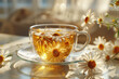 Camomile herbal tea in a transparent cup, close-up view, generative ai
