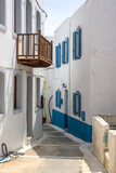 Fototapeta Konie - Narrow street in Nikia village on Nisyros island. Greece