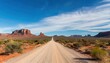 © Chase D’Animulls - long desolate dirt road path in desert of South West United States of America U.S.A. with Saguaro cactus, mesquite trees and tumbleweeds. blue sky background with clouds. arid climate with no water