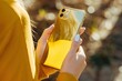 Captivating scene smiling person holding golden phone hand prestigious device luxury lifestyle 01