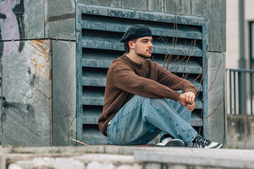 Sticker - young man on the street with skateboard