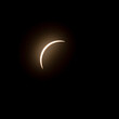 Final stage of the solar eclipse in April 2024 with the moon starting to cover the sun