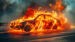 A car engulfed in flame on the road 
