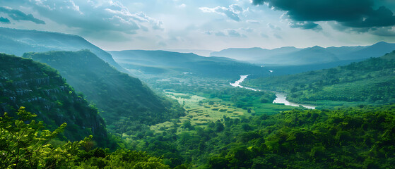 Wall Mural - a breathtaking view of a lush green valley. The scene is set against a partly cloudy sky, and it exudes tranquility and natural beauty