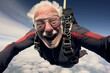 Elderly Asian man skydiving excited