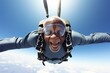 Elderly Asian man skydiving excited