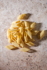 Wall Mural - pasta on a beige background