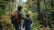 A father and son walking along a winding path the fathers hand resting on sons shoulder protectively. The boy looks up at . .