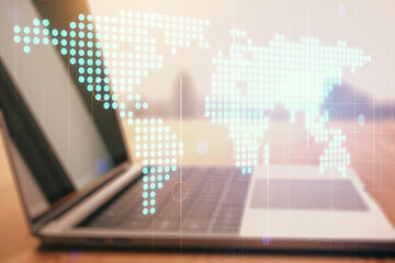 Wall Mural - multi exposure of abstract creative digital world map on modern laptop background, tourism and trave