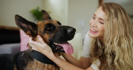 Canvas Print - Woman, dog and stroke in home for love connection as animal owner or relax wellness, together or care. Female person, german sheperd and lounge bonding with pet or emotional support, comfort or happy