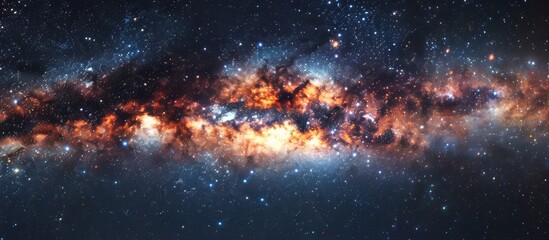 Wall Mural - This image features a vast galaxy filled with numerous twinkling stars and a strikingly bright orange center