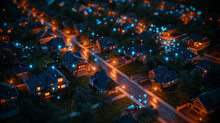 A City Street At Night With Houses Lit Up