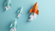 Origami Rockets Taking Off in a Stylized Paper Landscape