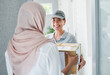 © peopleimages.com - Woman, delivery and package order by home front for online shopping box, export or distribution. Female person, hijab and back and house for customer logistics or shipping, import or supply chain