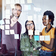 © peopleimages.com - Business people, glass and writing notes for tasks in office, teamwork and seo idea for solution. Colleagues, schedule and diversity for problem solving, support and speaking for project brainstorm