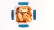 Toasts, bruschetta from sliced baguette, close up view, Toast in a plastic container on a white background.