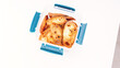 Toasts, bruschetta from sliced baguette, close up view, Toast in a plastic container on a white background.