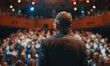 © Milan - Speaker facing audience in a conference hall
