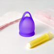 Hygiene Essentials: Purple Menstrual Cup, Tampon, Sanitary Pads, and Liners