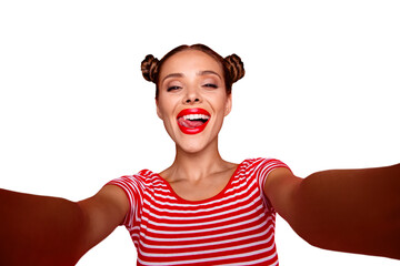 Wall Mural - Self portrait of happy pretty positive girl shooting selfie on front camera with two hands having video-call with friend isolated on red background. Joy fun concept