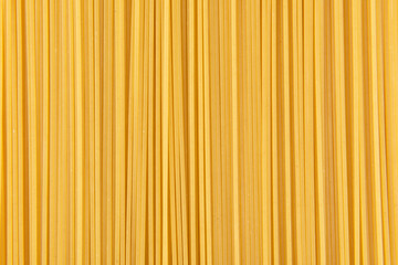 Raw dry spaghetti  italian pasta texture background.